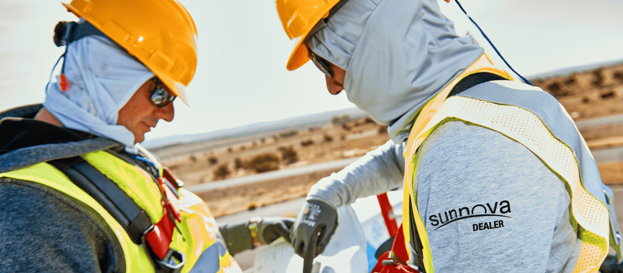 Sunnova dealers review plans for a ground mount solar array