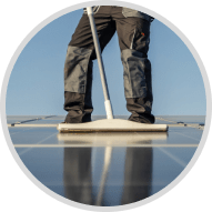 Scrubbing a solar panel with a sponge