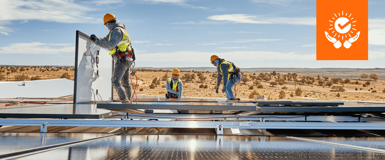 workers installing solar panels
