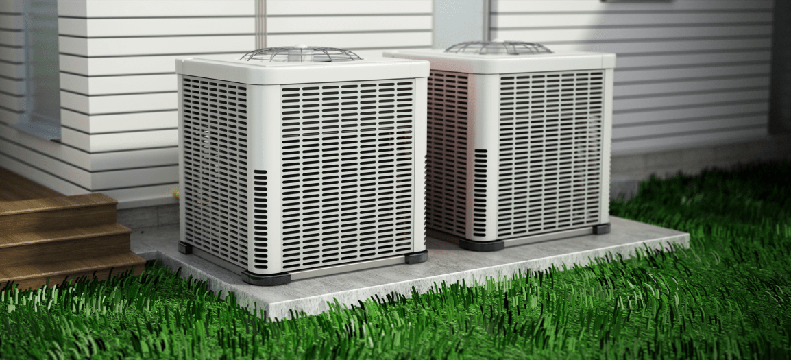 two HVAC next to house